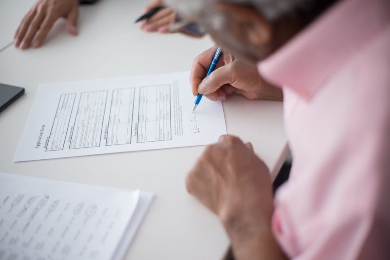 Person filling application form - Chronic medication (CDL) application letter template